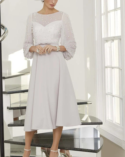 The pearl-embellished ball sleeves mum dress