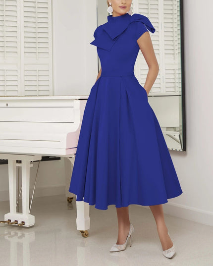 The bow-embellished retro bridal dress