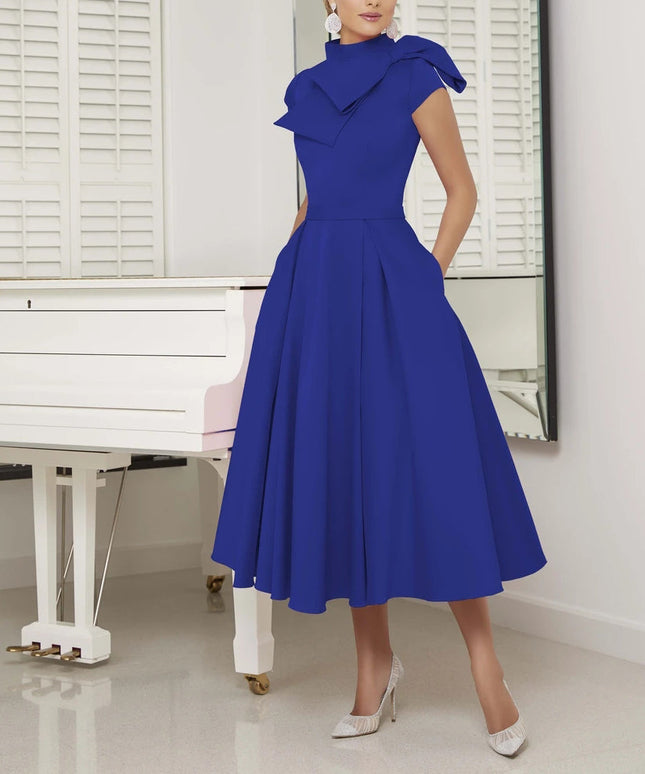 The bow-embellished retro bridal dress