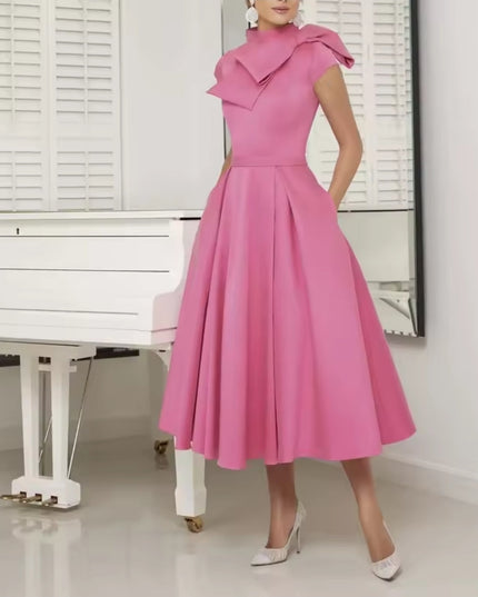 The bow-embellished retro bridal dress