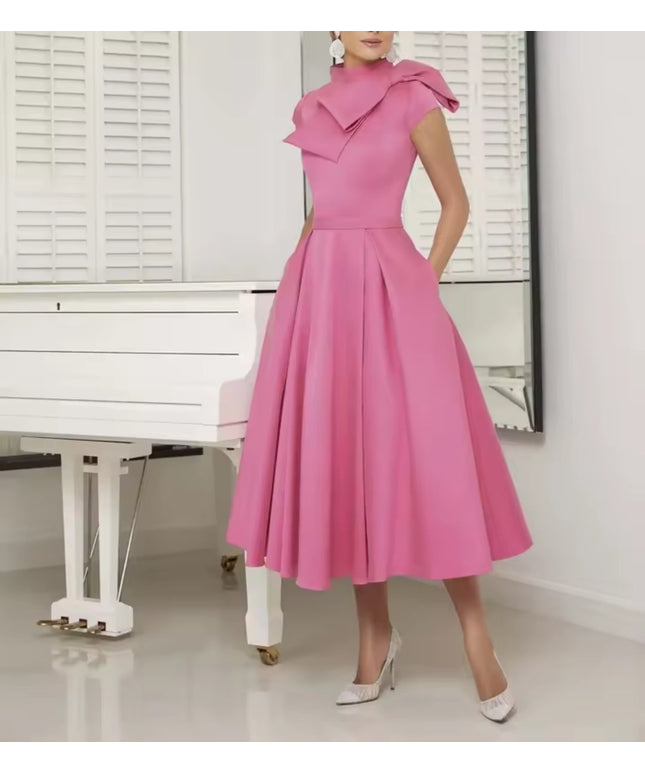 The bow-embellished retro bridal dress