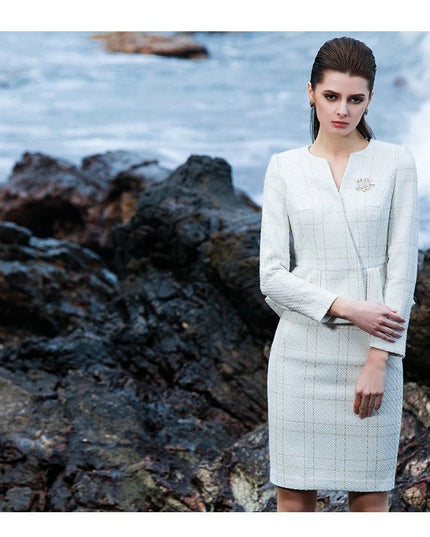 The pleated-peplum plaid tweed skirt suit (UK size 14)