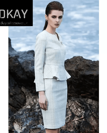 The pleated-peplum plaid tweed skirt suit (UK size 14)