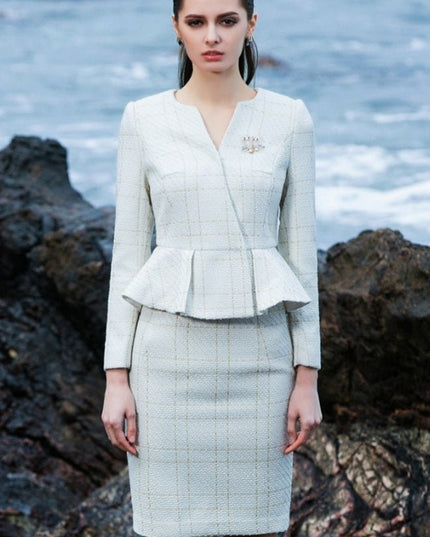 The pleated-peplum plaid tweed skirt suit (UK size 14)